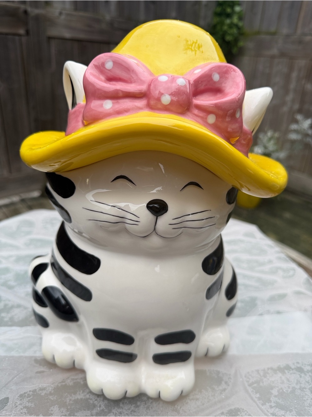 Certified International Ceramic Cat Treat Jar with Yellow Hat and Pink Bow